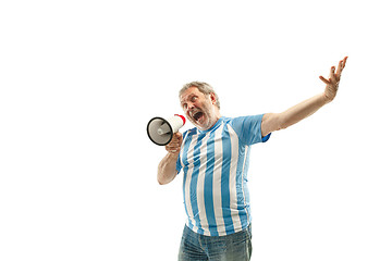 Image showing The Argentinean soccer fan celebrating on white background