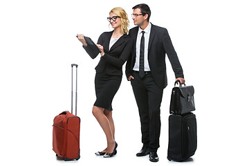 Image showing Businessman and business woman with travel cases