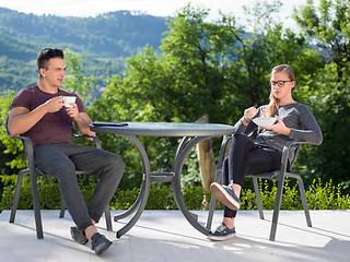 Image showing couple enjoying morning coffee and breakfast