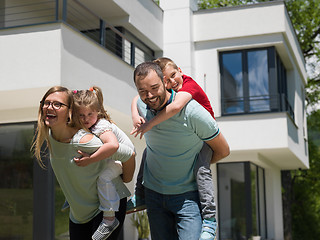 Image showing happy family with children in the yard