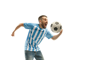 Image showing The Argentinean soccer fan celebrating on white background