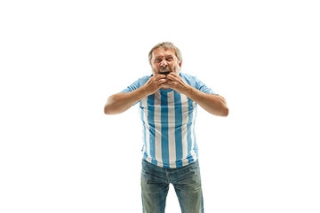 Image showing The unhappy and sad Argentinean fan on white background