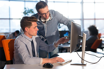 Image showing Two Business People Working With computer in office