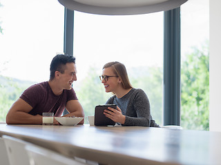 Image showing couple enjoying morning coffee and strawberries