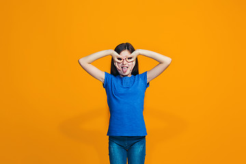 Image showing The squint eyed teen girl with weird expression