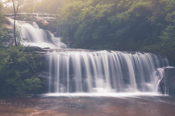 Image showing Beautiful full flowing waterfalls after rain