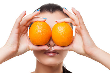 Image showing Beautiful girl with oranges