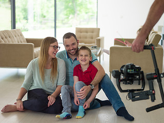 Image showing family with little boy enjoys in the modern living room