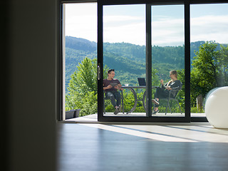 Image showing couple enjoying morning coffee and breakfast