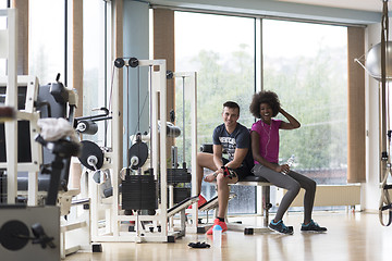 Image showing couple in a gym have break