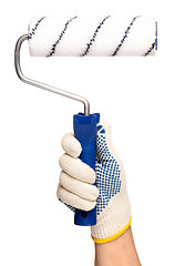 Image showing Hand with glove and paint roller