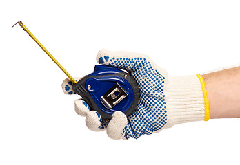 Image showing Hand with glove and tape measure