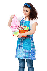 Image showing Young housewife on white