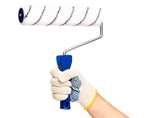 Image showing Hand with glove and paint roller