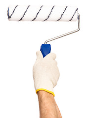 Image showing Hand with glove and paint roller