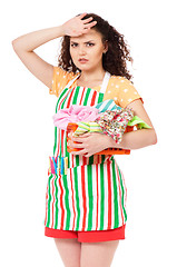 Image showing Young housewife on white