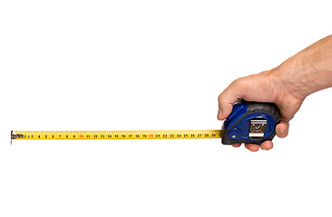 Image showing Hand with tape measure