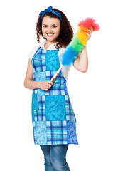 Image showing Young housewife on white