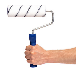 Image showing Hand with paint roller