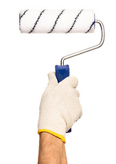 Image showing Hand with glove and paint roller