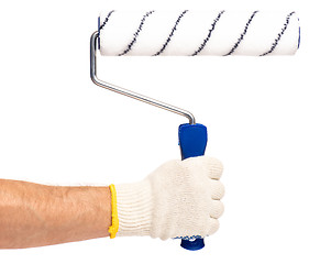 Image showing Hand with glove and paint roller