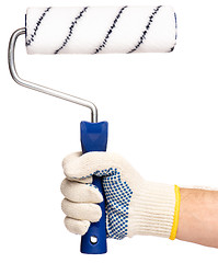 Image showing Hand with glove and paint roller