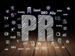 Image showing Advertising concept: PR in grunge dark room