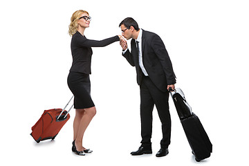 Image showing Businessman and business woman with travel cases