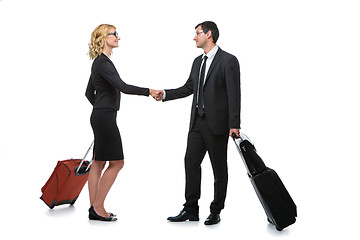 Image showing Businessman and business woman with travel cases