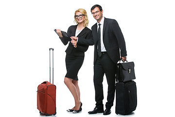 Image showing Businessman and business woman with travel cases