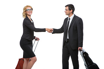 Image showing Businessman and business woman with travel cases