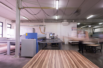 Image showing worker in a factory of wooden furniture