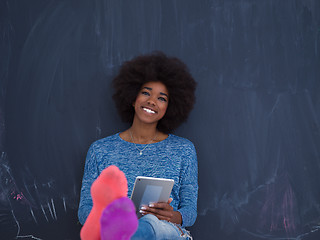 Image showing Happy African American Woman Using Digital Tablet