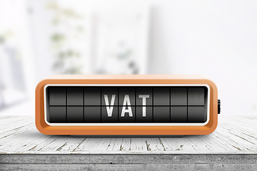 Image showing VAT tax sign in form of a retro alarm clock