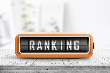 Image showing Ranking sign on a wooden table with planks