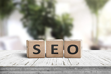 Image showing SEO word sign on a table in a bright room