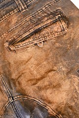 Image showing Trousers with mud