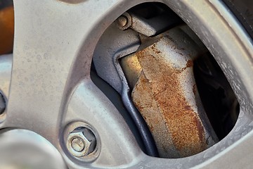 Image showing Wheel closeup with rusty brakediscs