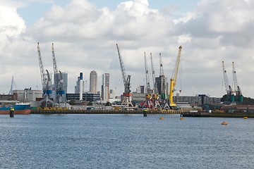 Image showing Industrial ships in dock with rotterdam city view