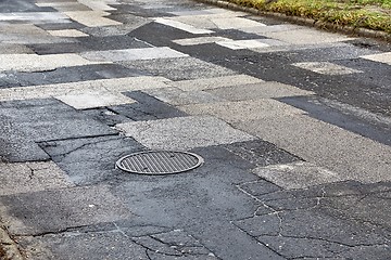 Image showing Patched broken road