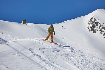 Image showing Snowboarder in the Alps