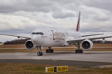 Image showing Plane taxiing at airport