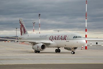 Image showing Plane taxiing at airport