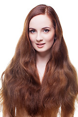 Image showing Beautiful girl with long red brown hair