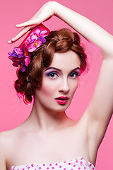 Image showing Beautiful girl with bright make-up and pink hat