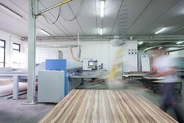 Image showing worker in a factory of wooden furniture