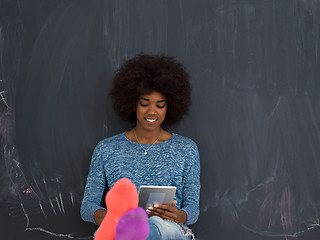 Image showing Happy African American Woman Using Digital Tablet