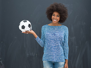 Image showing black woman holding a soccer bal