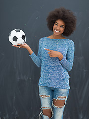 Image showing black woman holding a soccer bal