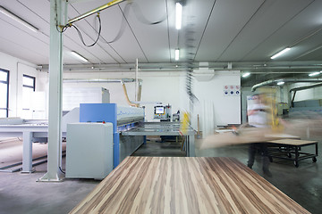 Image showing worker in a factory of wooden furniture